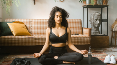 woman starting her day with meditation