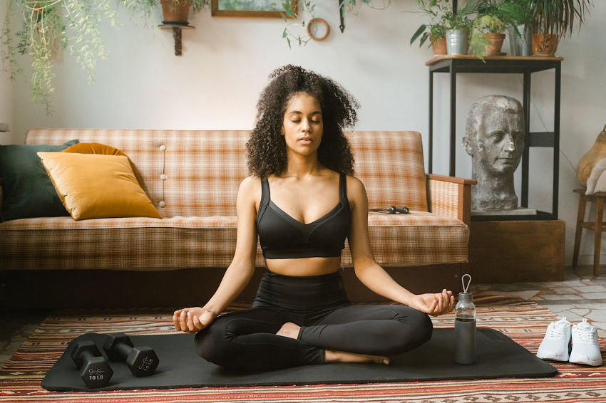 woman starting her day with meditation