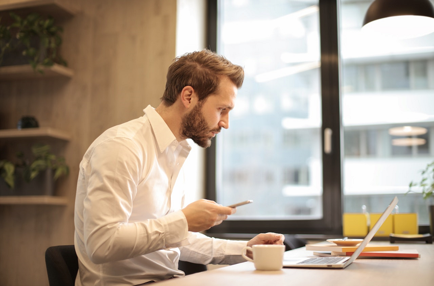 man looking at computer