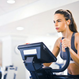 woman on treadmill looking very motivated