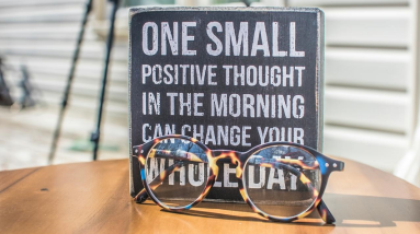 sign with the words one small positive thought in the morning can change your whole day
