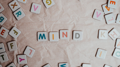 the word mind spelt out with small tiles