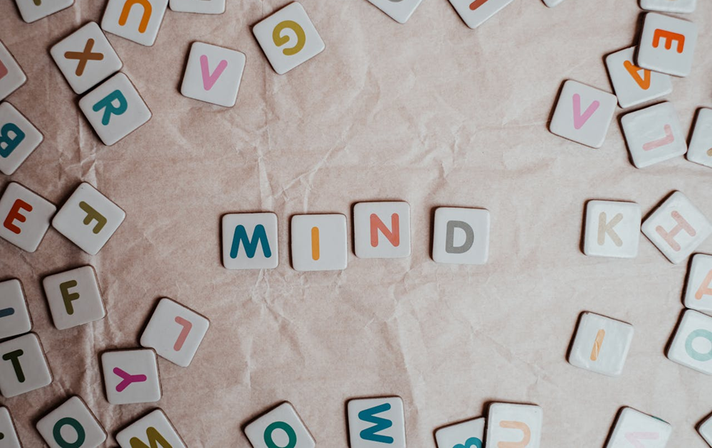 the word mind spelt out with small tiles