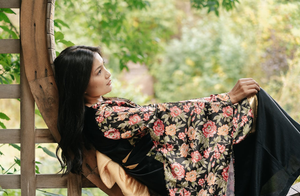 woman enjoying quiet time outside in garden