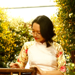 woman sitting in garden enjoying alone time
