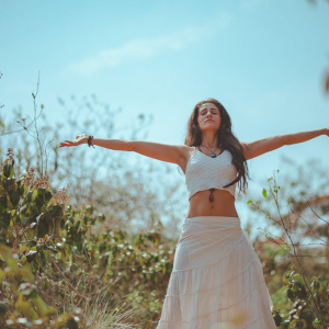 woman outside in nature enjoying solitude