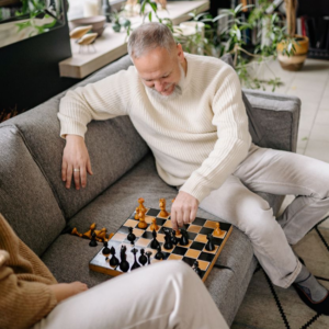 senior couple playing chess